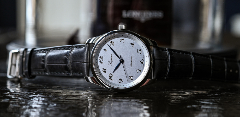 часы Longines Master Collection 190th Anniversary на столе