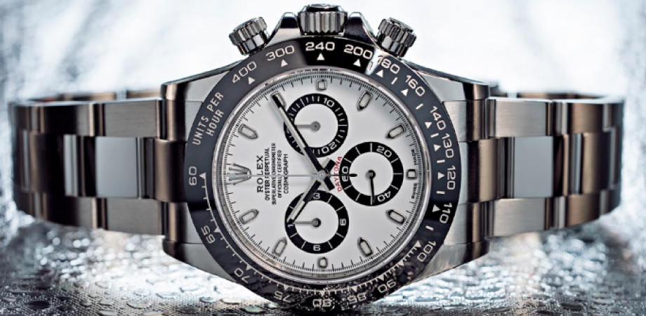 Часы Rolex Daytona с белым циферблатом на боку